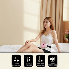 White rechargeable menstrual cramp relief massager with heat and vibration settings on neutral background