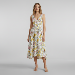 Woman in black deep v-neck midi tank dress, fluid silhouette, minimalist styling, natural light