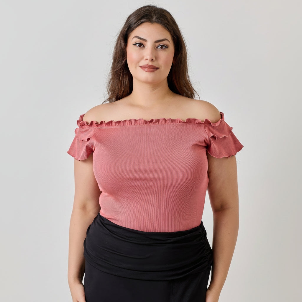 Ginger ribbed knit off-shoulder top with cascading double ruffle detail, worn with fitted silhouette
