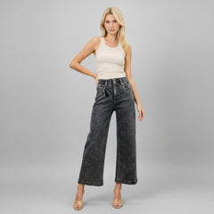 Woman in washed black high-rise wide crop jeans with stretch cotton-poly blend, cropped wide-leg silhouette