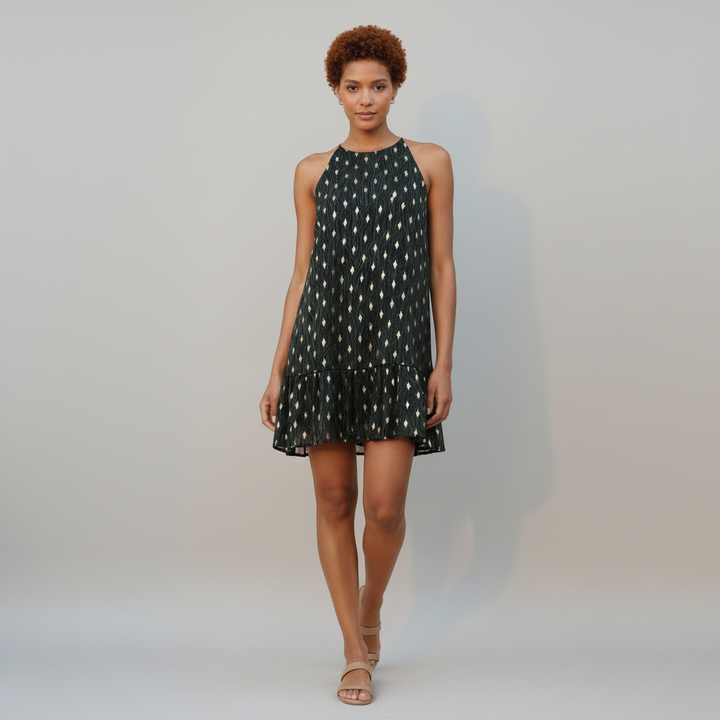 Hunter green ruffle halter dress with metallic lurex threads, high neckline, and ruffled hemline on model
