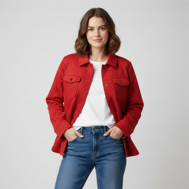 Woman wearing structured black textured jacket with collared neckline and snap-button front closure, soft stretch fabric