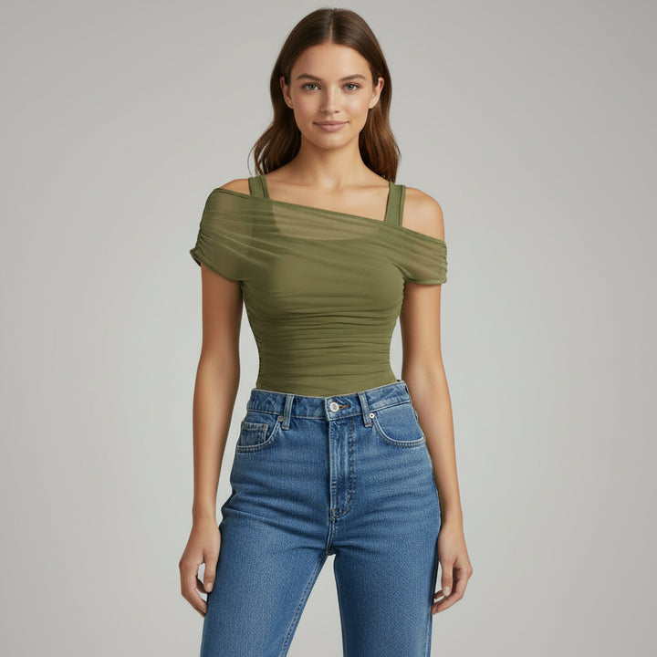 Black ruched mesh crop top with off-shoulder neckline and asymmetric gathered detail on model