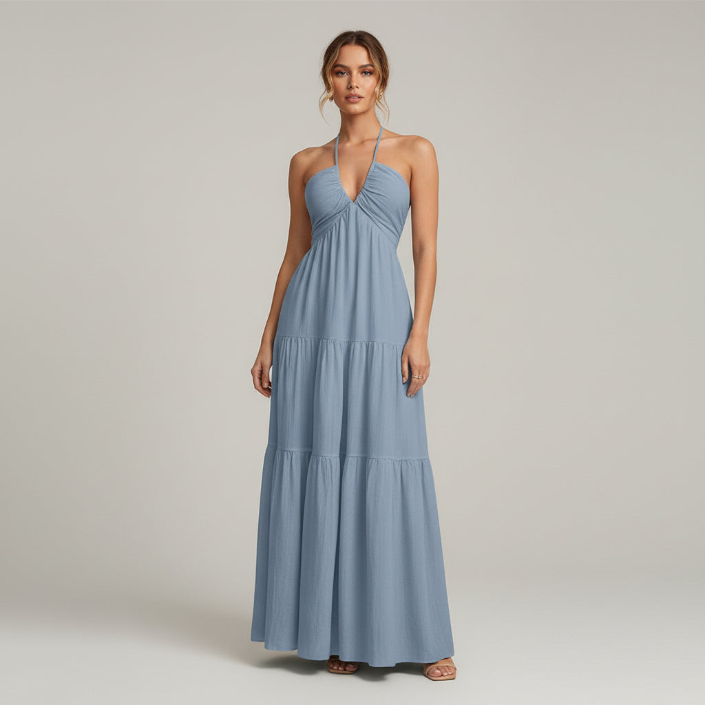 Woman in white A-line dress with ruffled hem and medium stretch fabric, minimalist silhouette