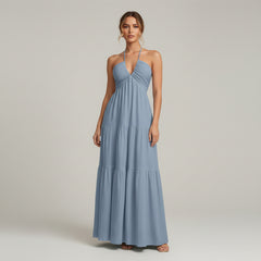 Woman in white A-line dress with ruffled hem and medium stretch fabric, minimalist silhouette