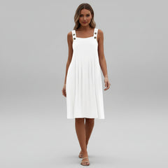 Woman in flowy black overalls maxi dress with wide-leg silhouette and adjustable straps, lightweight drape fabric