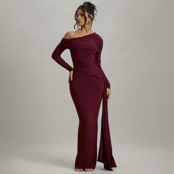 Black one-shoulder maxi dress with asymmetric neckline and flowing skirt, structured bodice detail