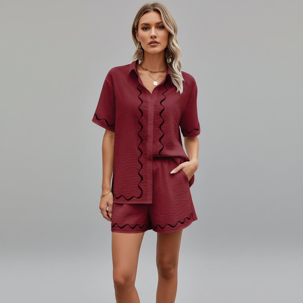 Woman wearing relaxed button-down two-piece set in soft linen fabric, casual silhouette