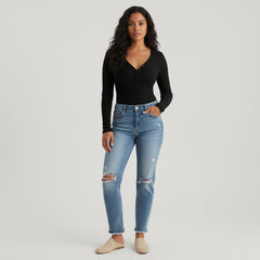 Woman in black slim-fit V-neck long sleeve top, contoured silhouette with viscose-elastane stretch