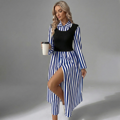 Woman wearing black and white striped midi dress with tiered layers, standing in natural light
