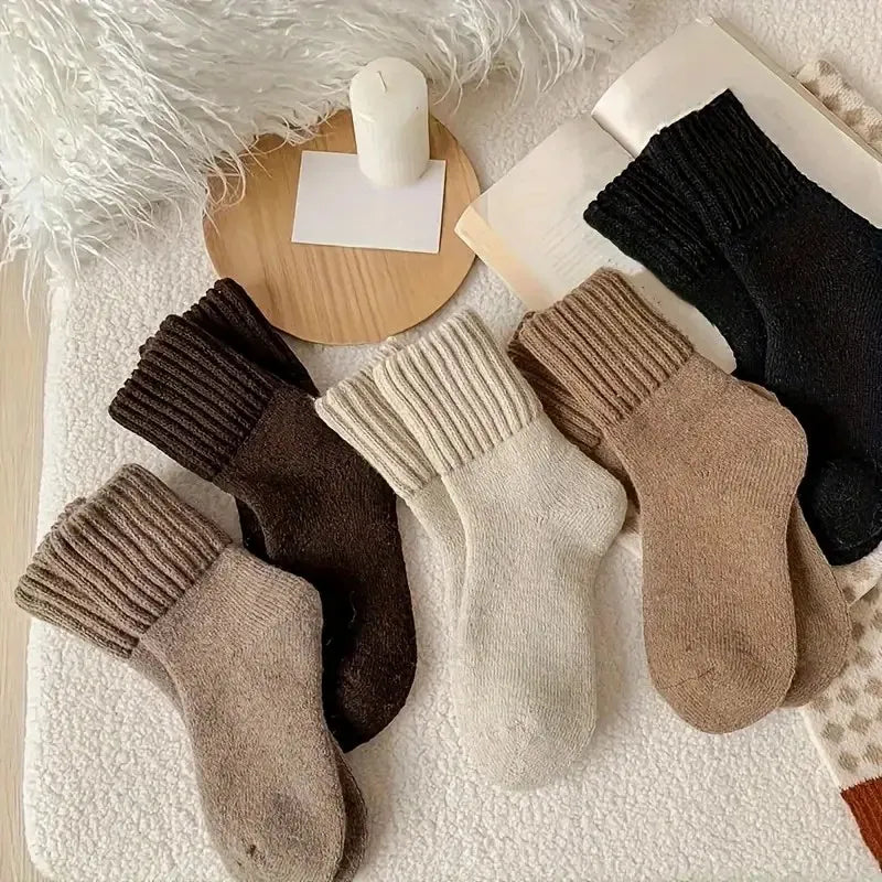 Cocoon Thermal Plush Socks in cream, fleece-lined texture visible, worn on feet against neutral background