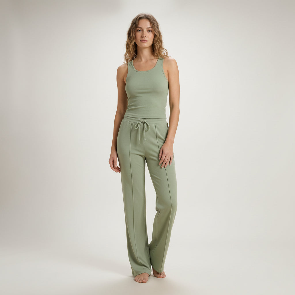 Woman in brown ribbed tank top and matching pants with drawstring waist, relaxed fit loungewear set